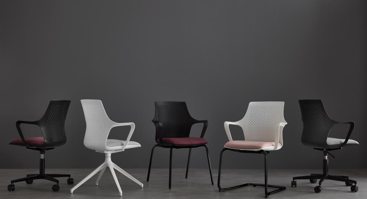 GC7 Range of Chairs by Gresham Office Furniture. A range of coloured shells with integrated armrests and curved backrest.