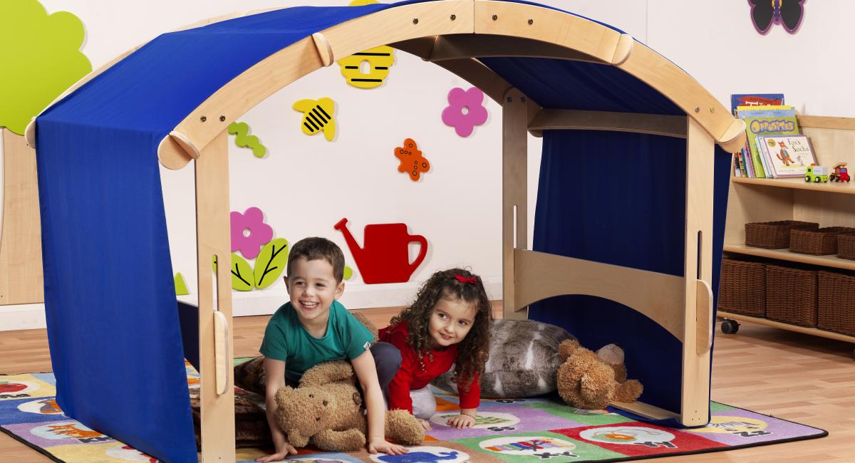 Inspirational Nurseries - Indoor wooden frame, blue fabric arch for creative play.