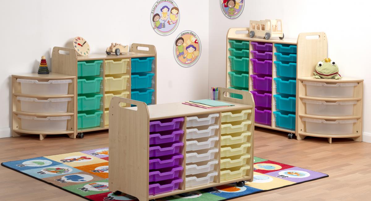 Inspirational Nurseries - Wooden tray storage with coloured plastic trays suitable for early years / nurseries.