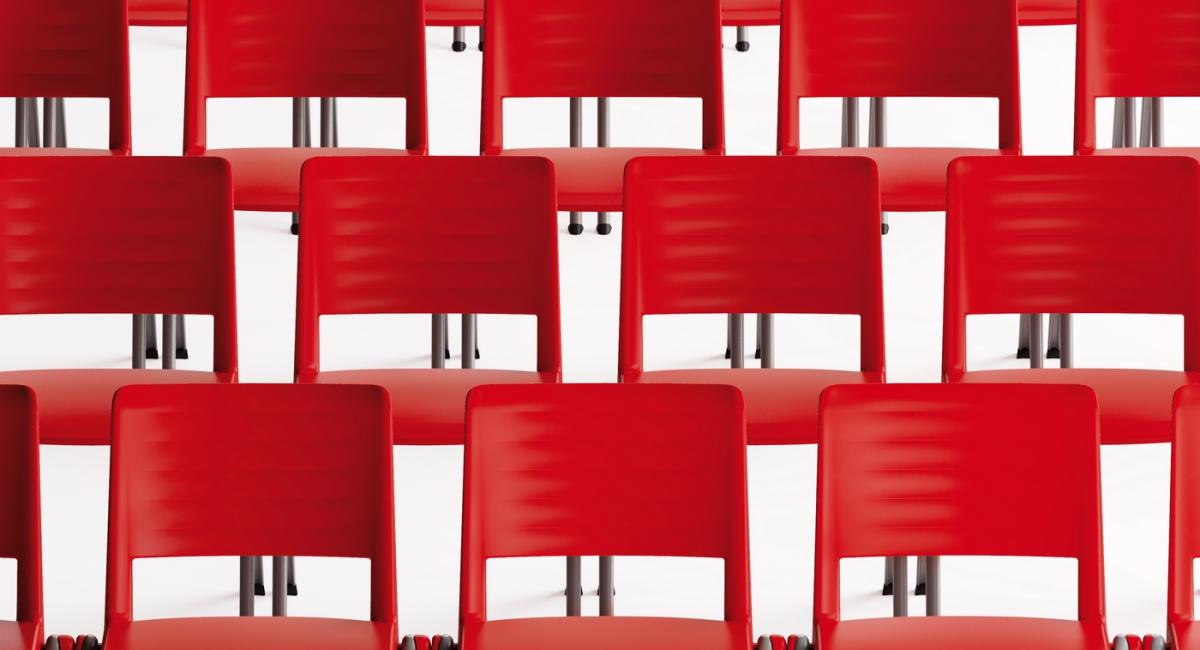 Salto Mulitpurpose chair finished in red polypropylene seat and back with chrome legs. 