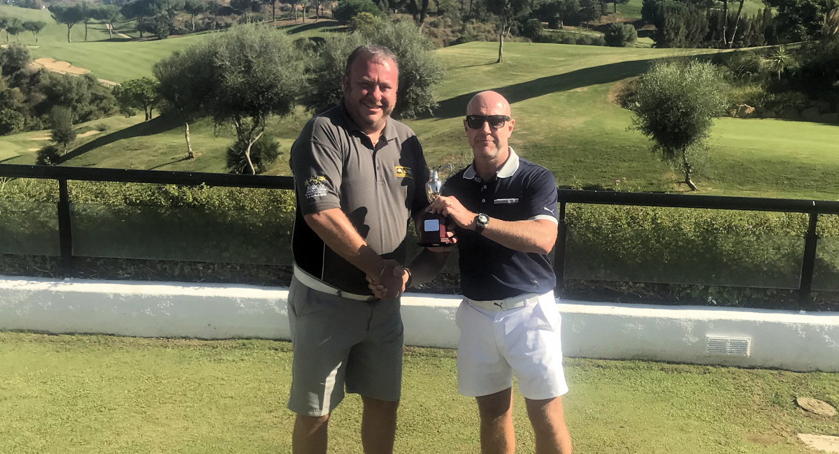 Darren Griffin receiving trophy after successfully winning the Golf Tournament in La Cala in Spain.